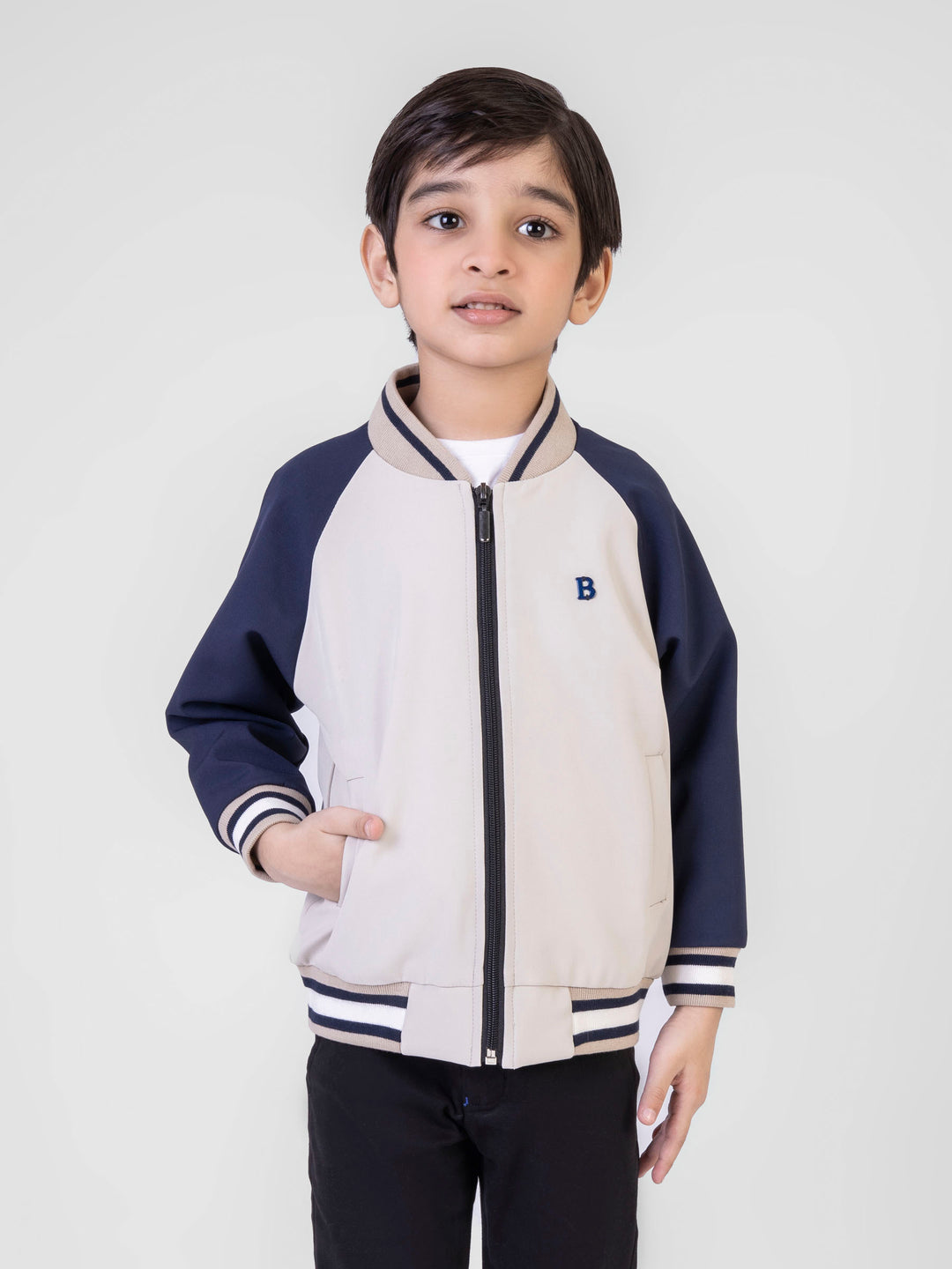 Beigeraglanjacketwithcontrastingsleeves collarbrumanopakistan