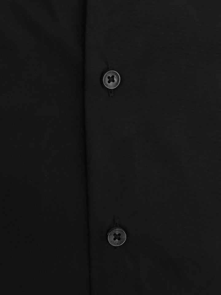 Close up of black cotton blend satin fabric texture