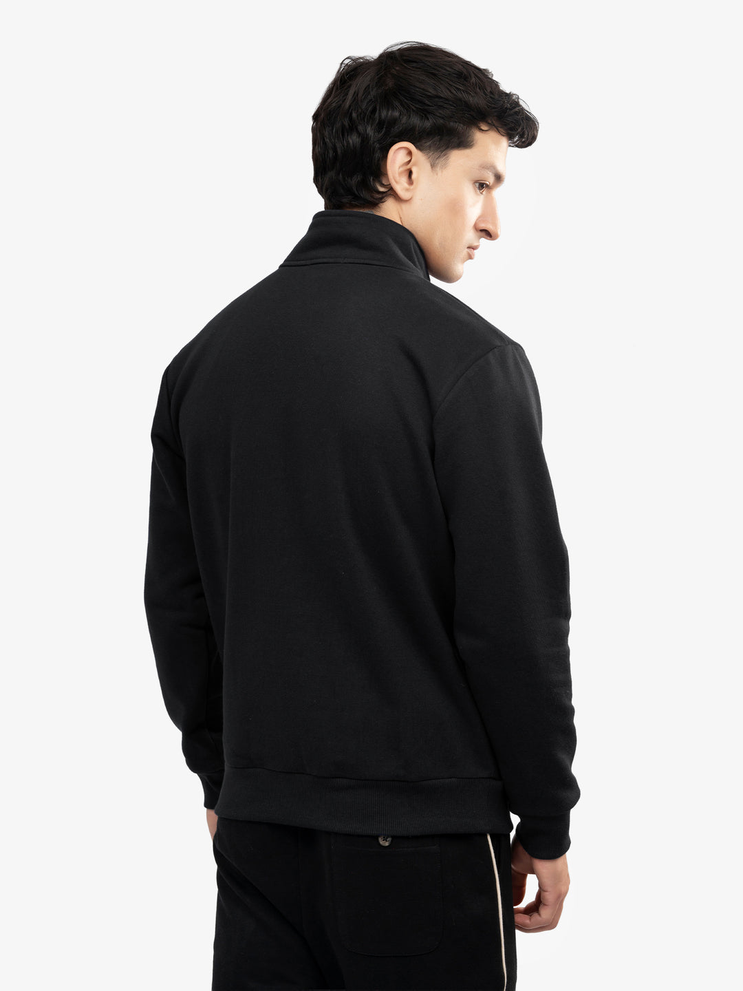 Back view of black quarter zip sweater