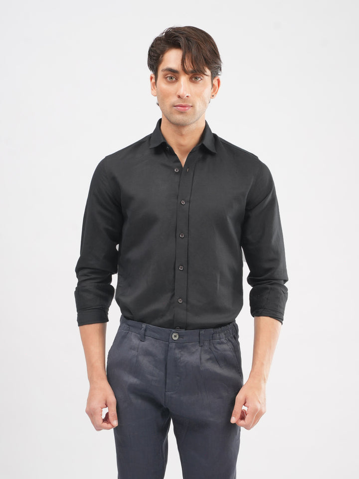 Model wearing black formal shirt for office