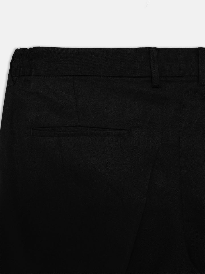 Men's black trousers back pocket and waistband detail