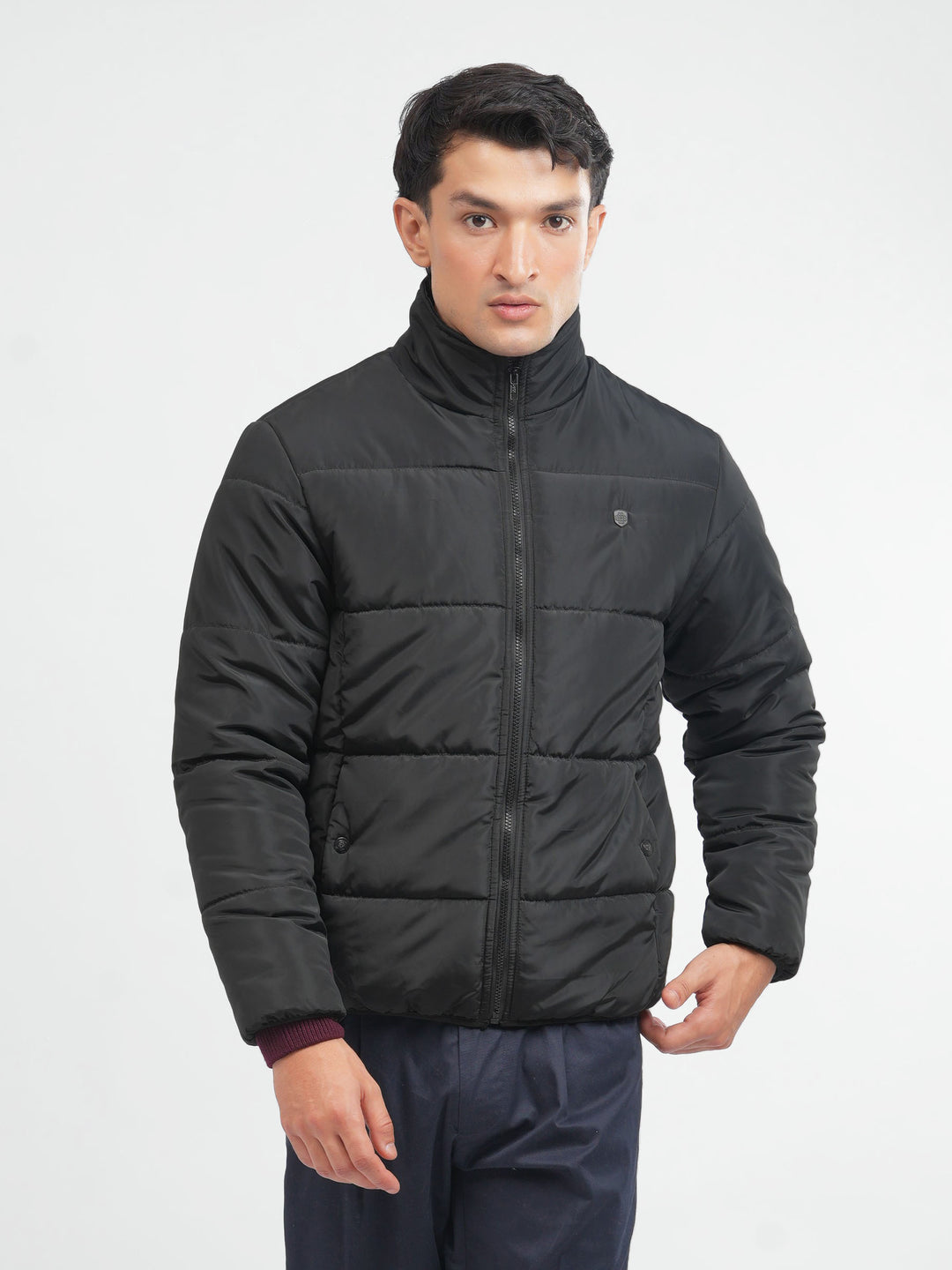 Model wearing black puffer jacket for men