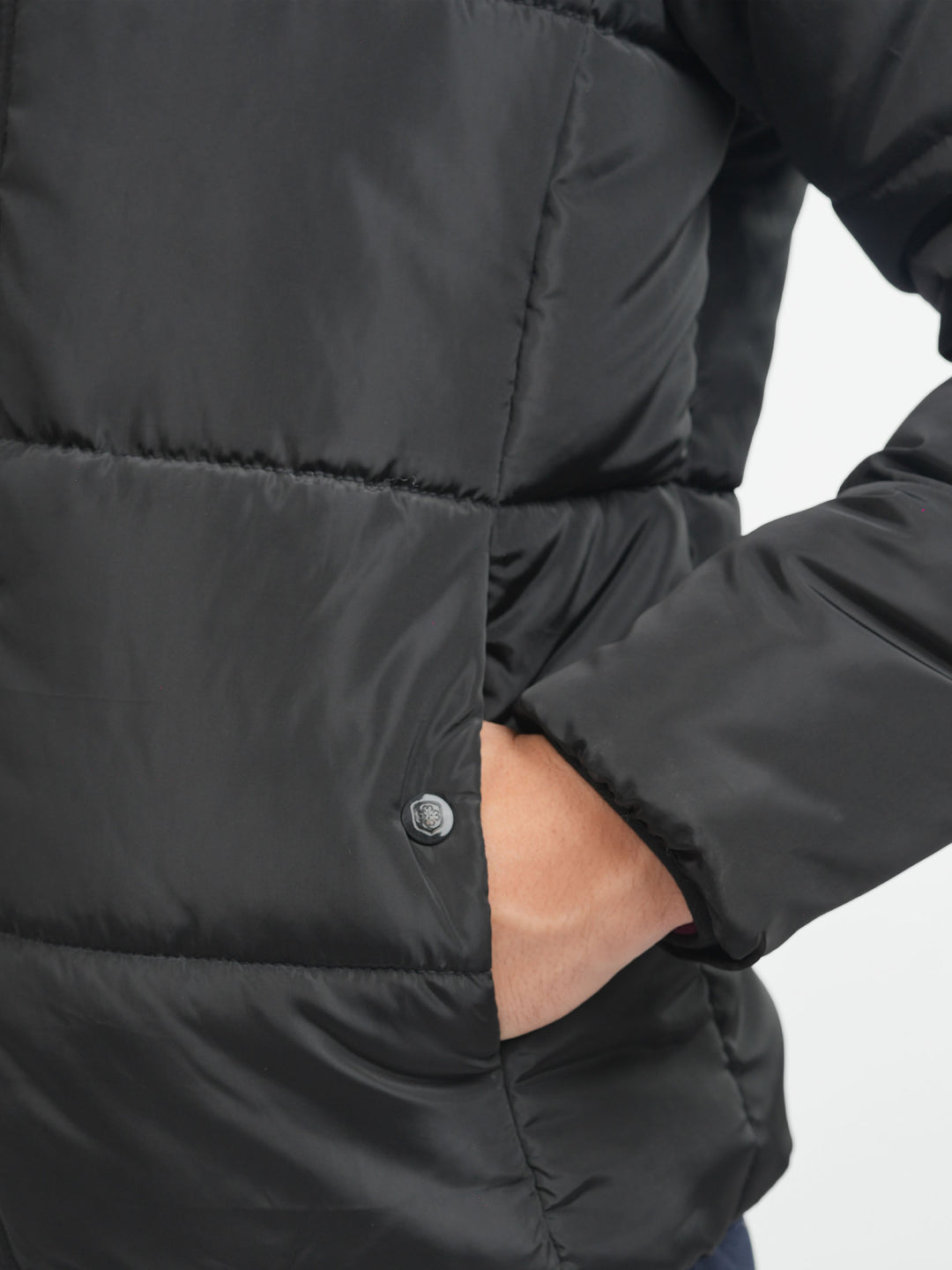 Close up of black polyester quilted fabric texture