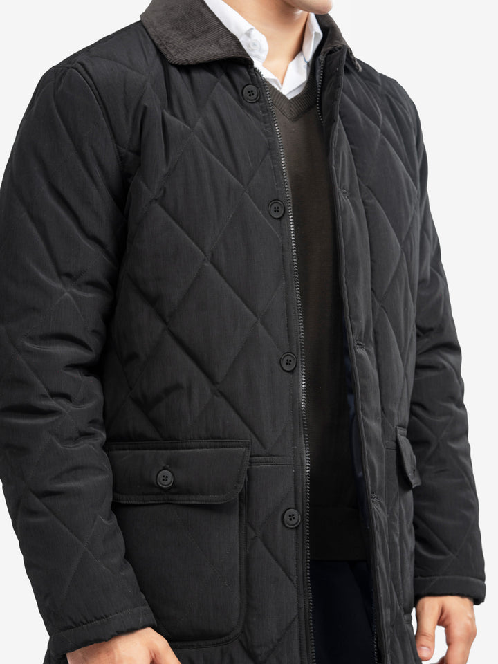 Close up of corduroy collar on black jacket