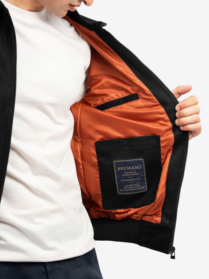 Inner view of black polyester suede jacket
