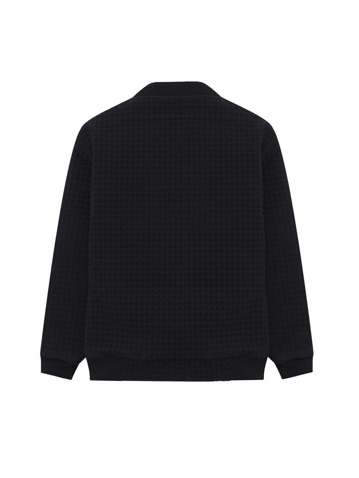 Boys black bomber jacket lifestyle shot