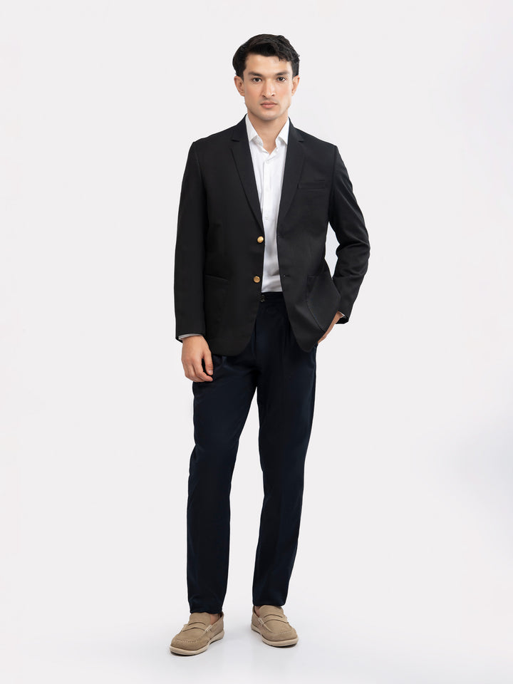 Polyester lining detail inside men's black blazer