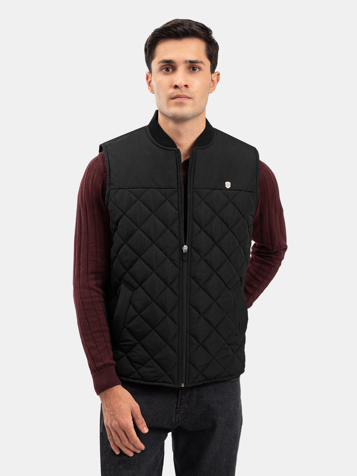 Black Sleeveless Quilted Jacket With Ribbed Baseball Collar