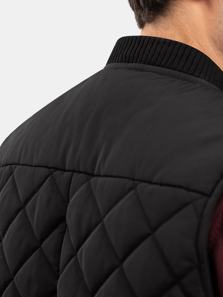 Black Sleeveless Quilted Jacket With Ribbed Baseball Collar