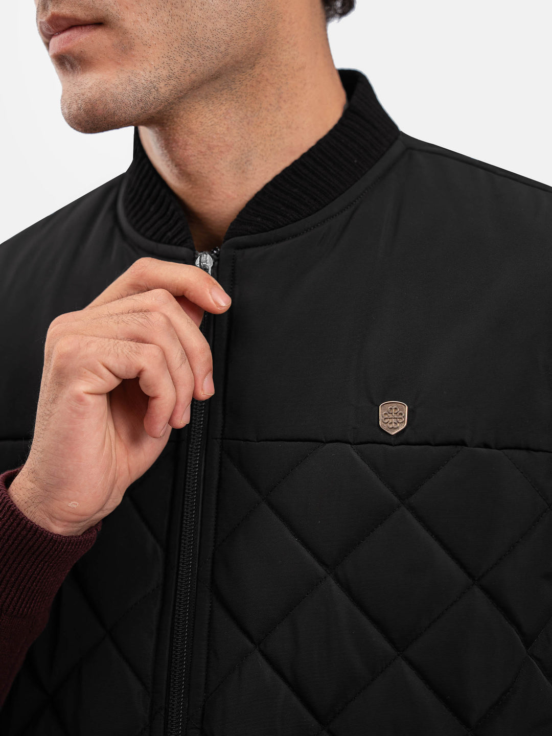 Black Sleeveless Quilted Jacket With Ribbed Baseball Collar