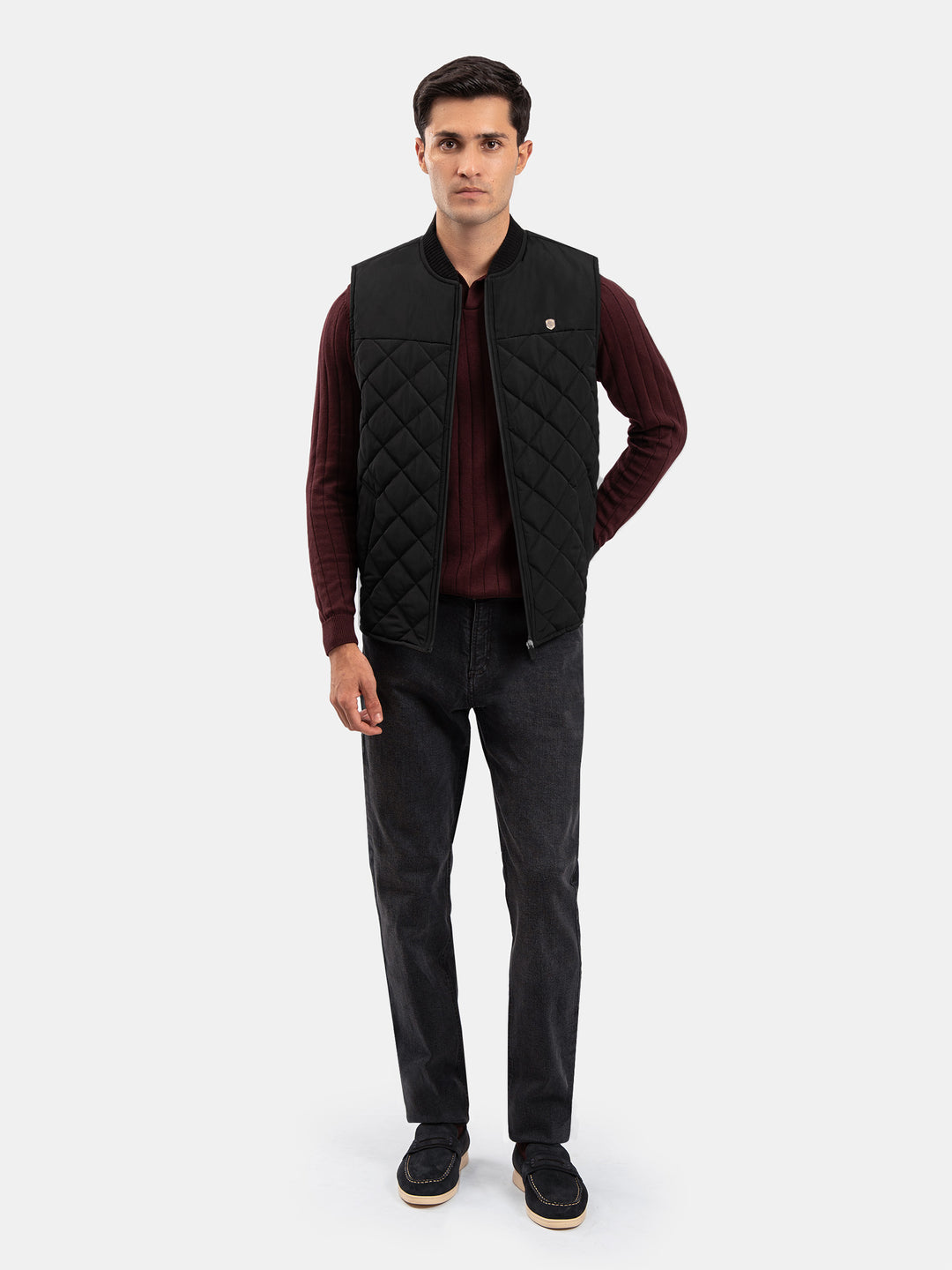 Black Sleeveless Quilted Jacket With Ribbed Baseball Collar