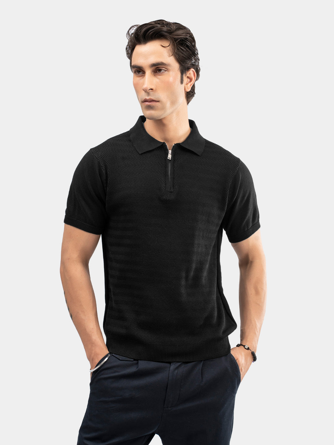 Men's black textured flat knit zipper polo front view