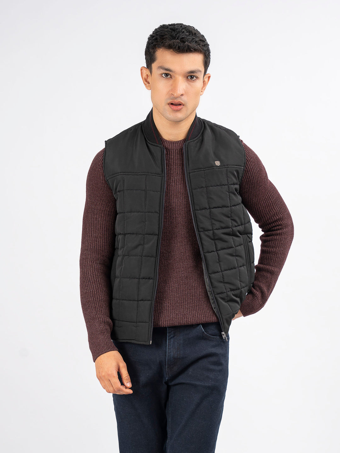 Blacksleevelessquiltedjacketwithsportybaseballcollarbrumanopakistan3