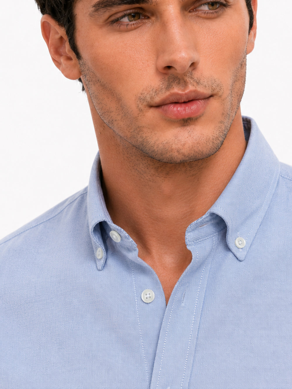 Close up of 100% cotton fabric on blue men shirt