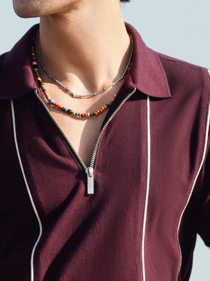 Close-up of quarter-zip collar on 100% cotton polo shirt