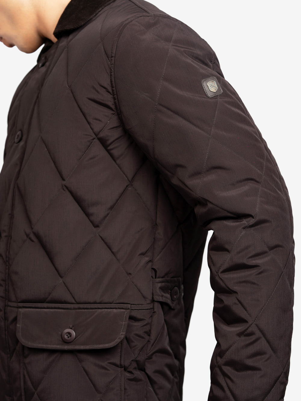 Side view of long quilted winter coat
