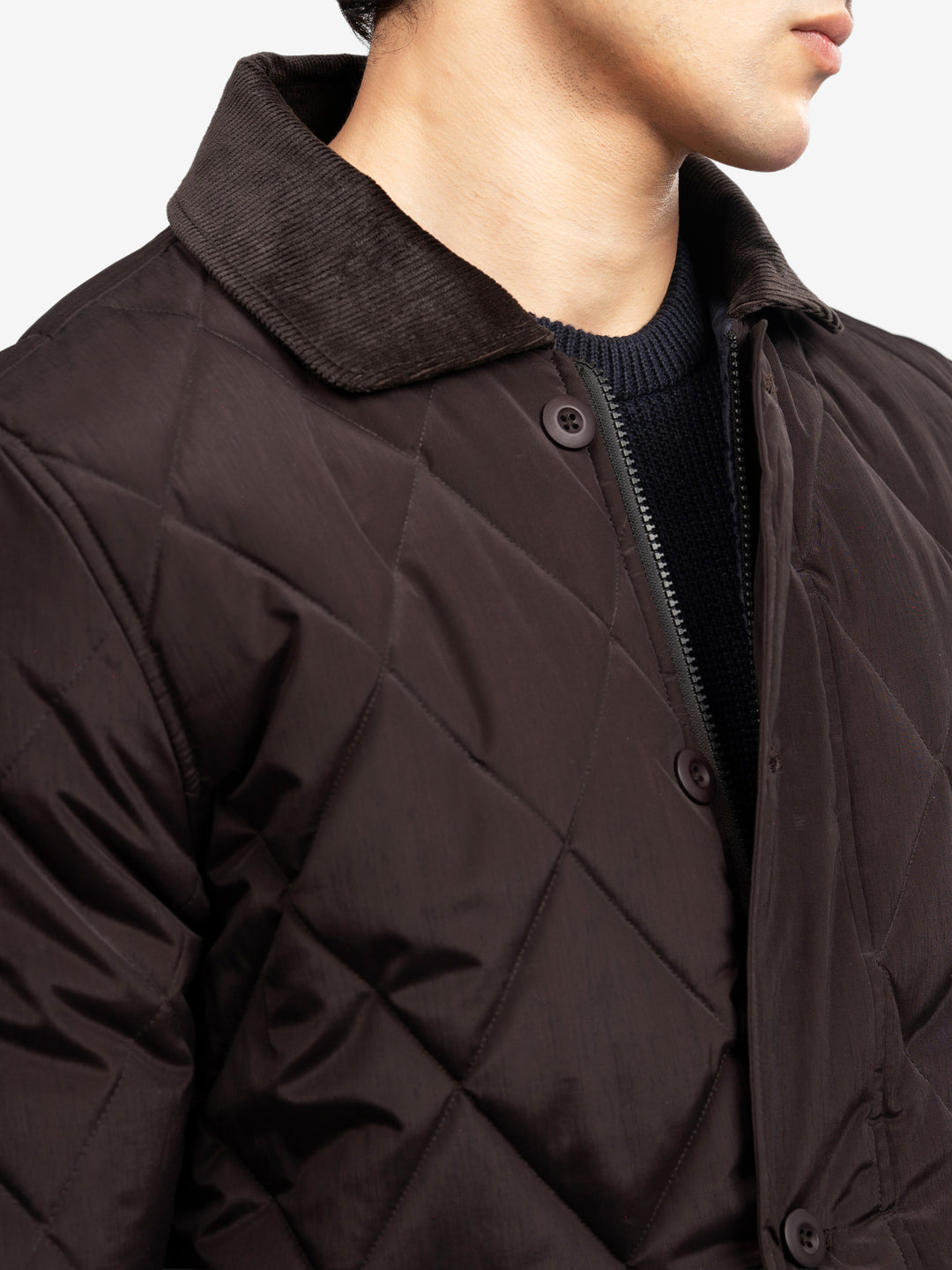  Close up of corduroy collar on burgundy jacket