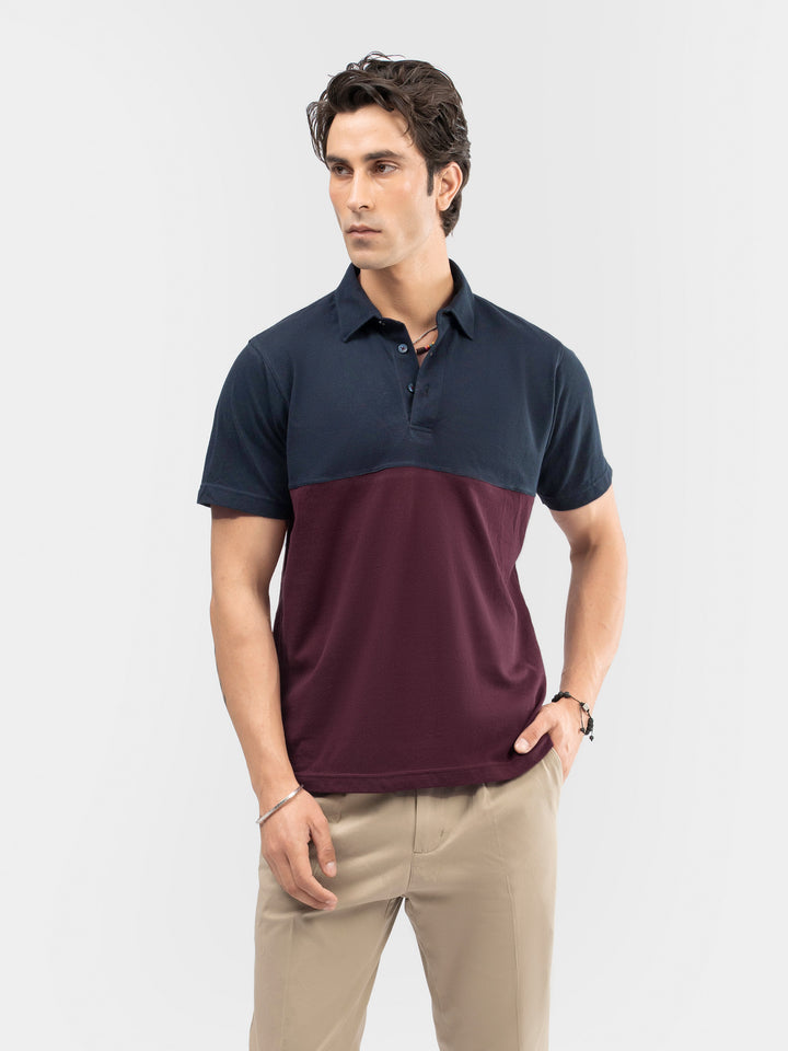 Men's burgundy and navy blue polo shirt front view
