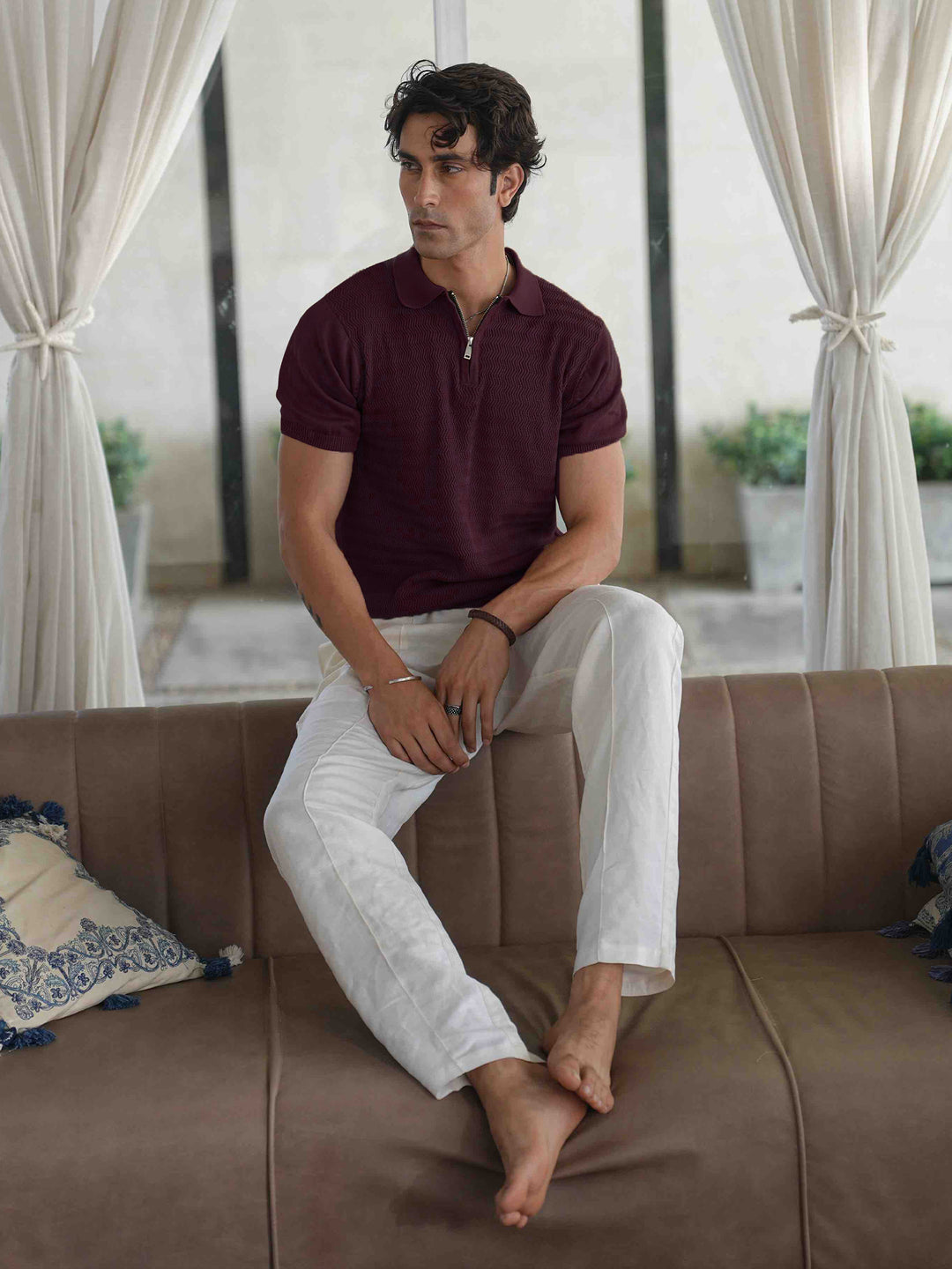 Man wearing burgundy smart casual zipper polo shirt