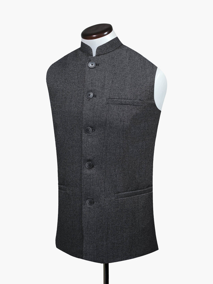 Button detail on charcoal winter waistcoat