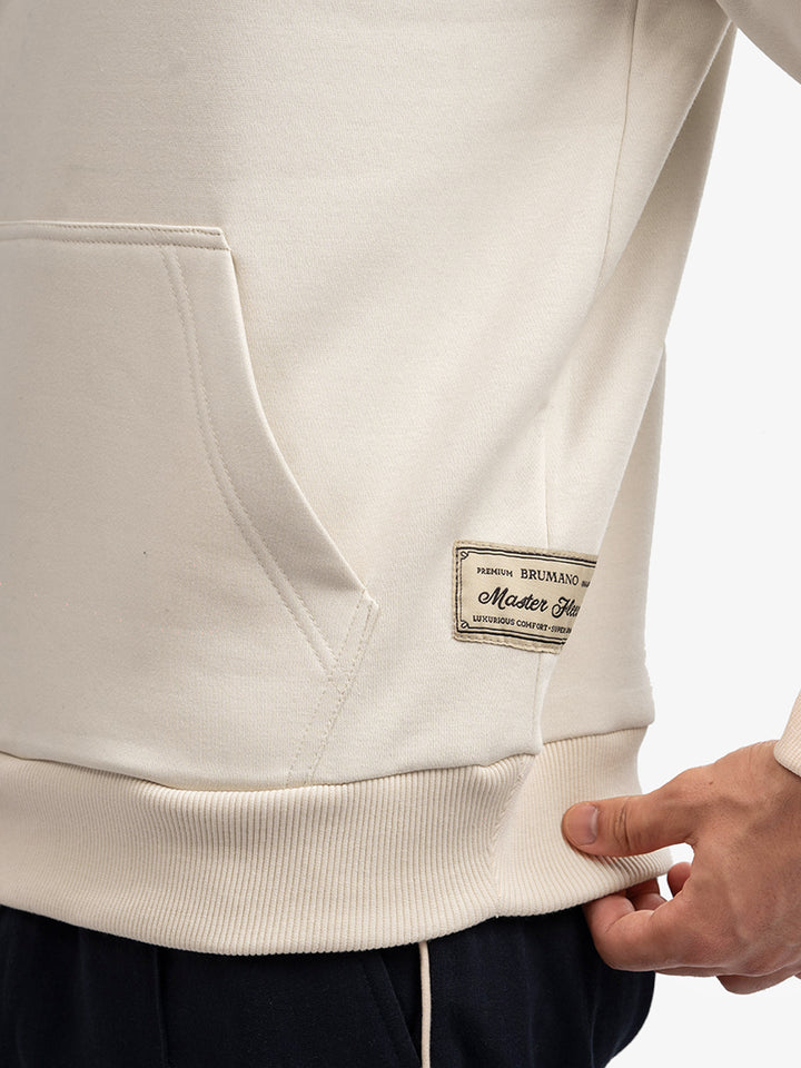 Close up of cream cotton blend hoodie fabric texture