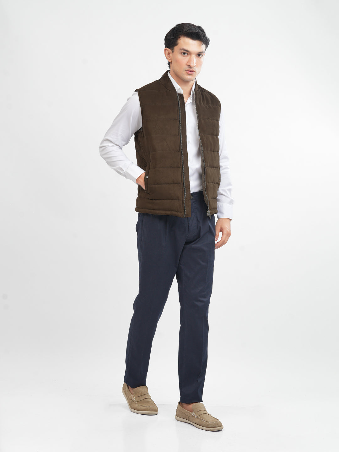  model wearing dark brown gilet with formal outfit
