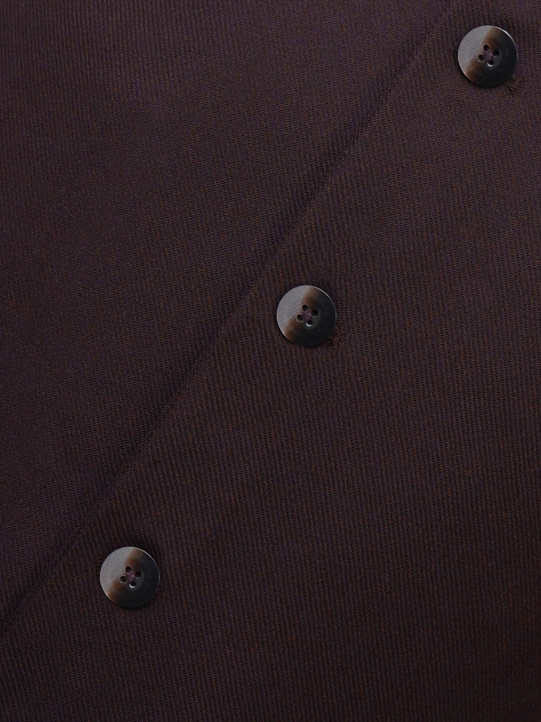 Close up of burgundy wool blend fabric texture