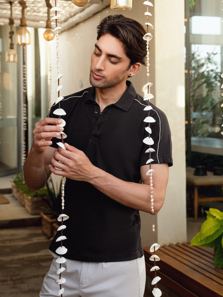 Man wearing dark brown cotton polo shirt