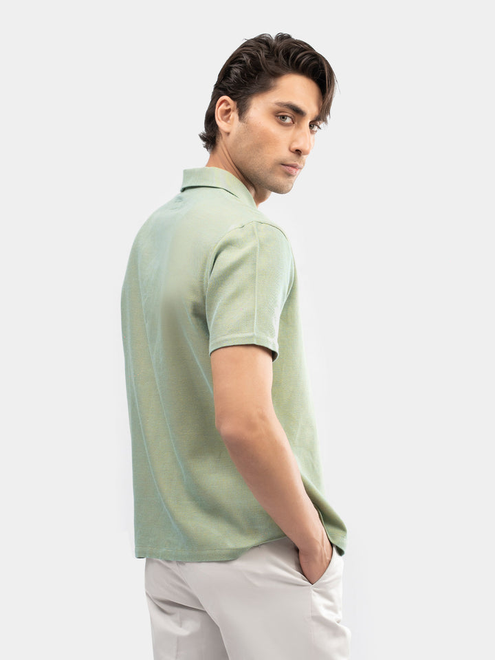 Back view of green cuban collar shirt for men