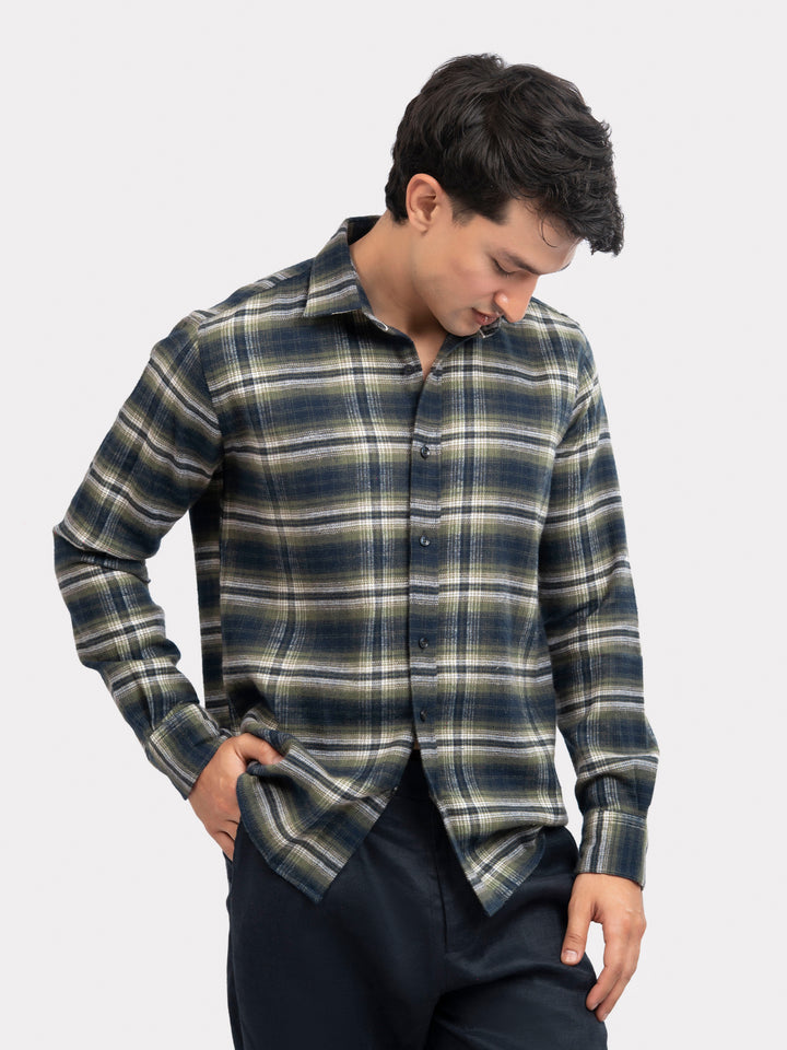 Model wearing casual flannel shirt in Pakistan