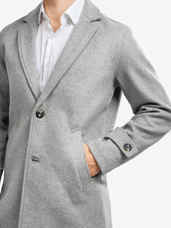 Close up of grey wool fabric texture and buttons