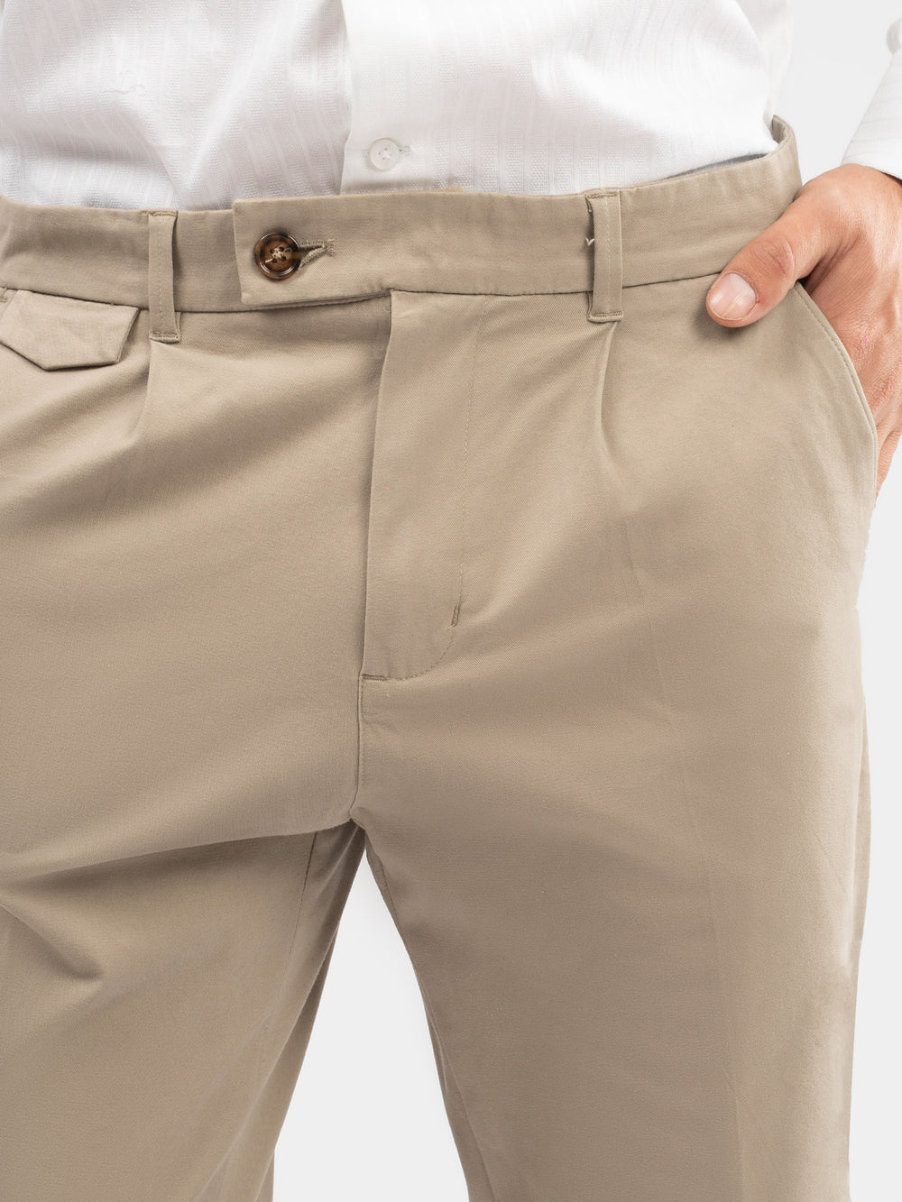 Close up of front pleat detailing on khaki trousers