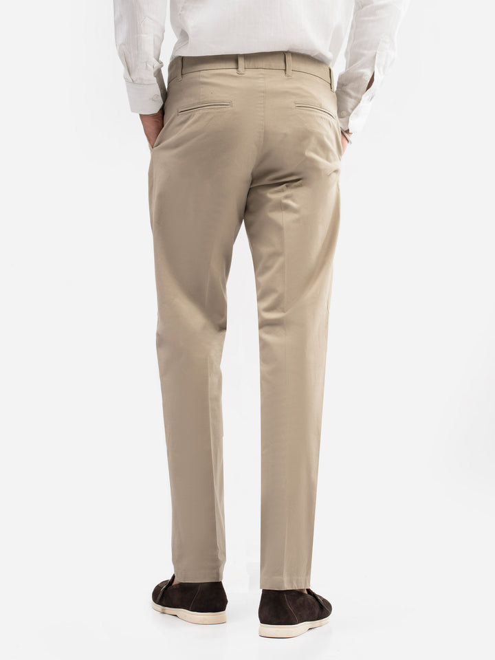 Back pocket and belt loop view of khaki chinos