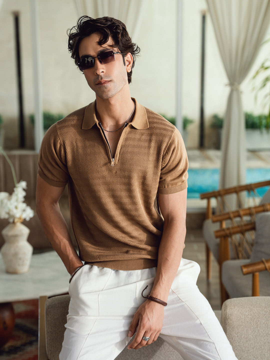 Men's mid brown textured flat knit zipper polo front view