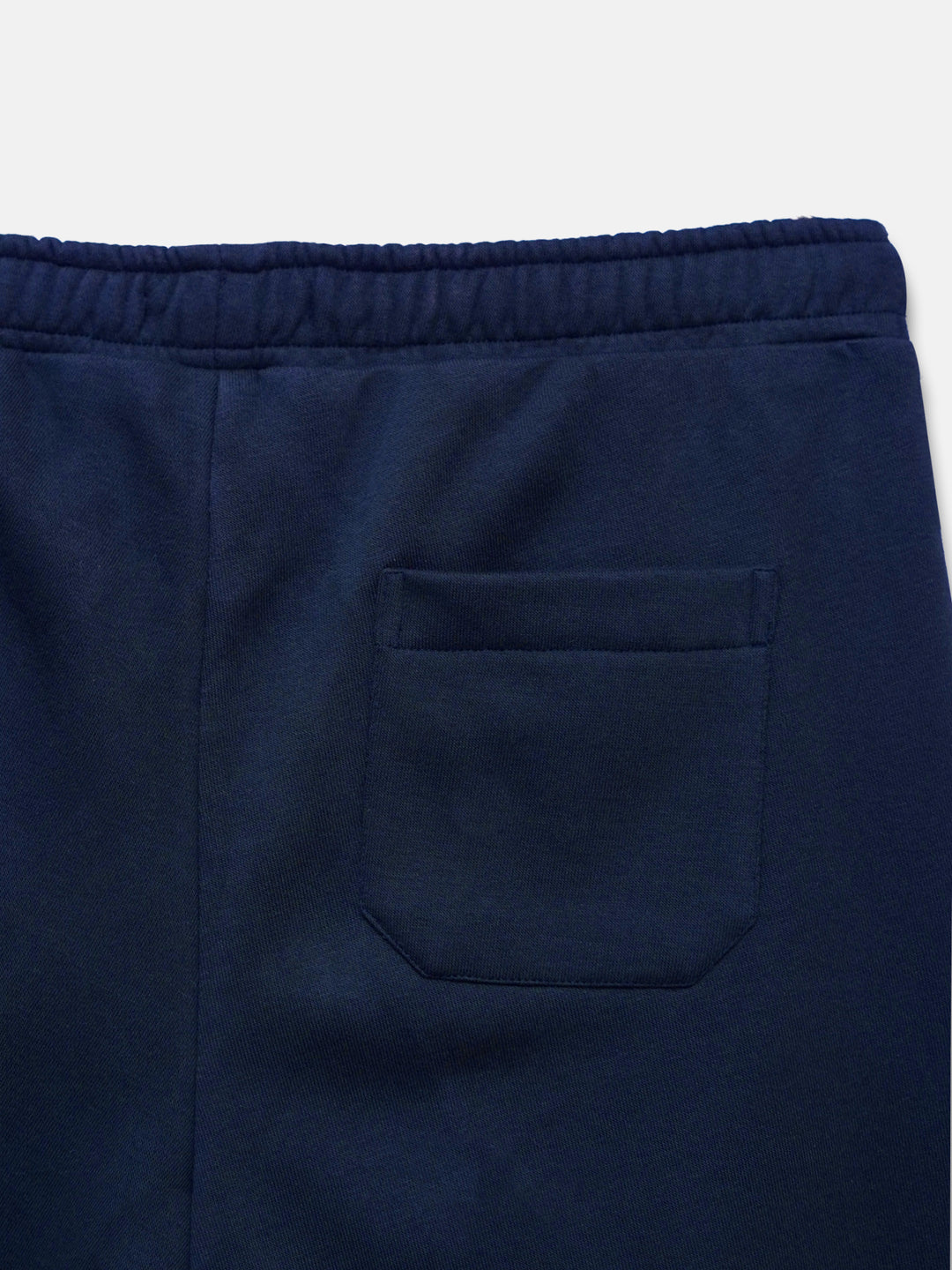 Back view of navy blue fleece sleepwear trousers with back pocket