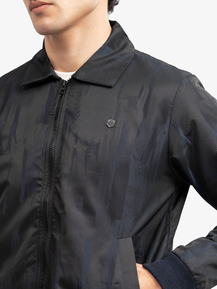 Close up of structured collar detail on navy jacket