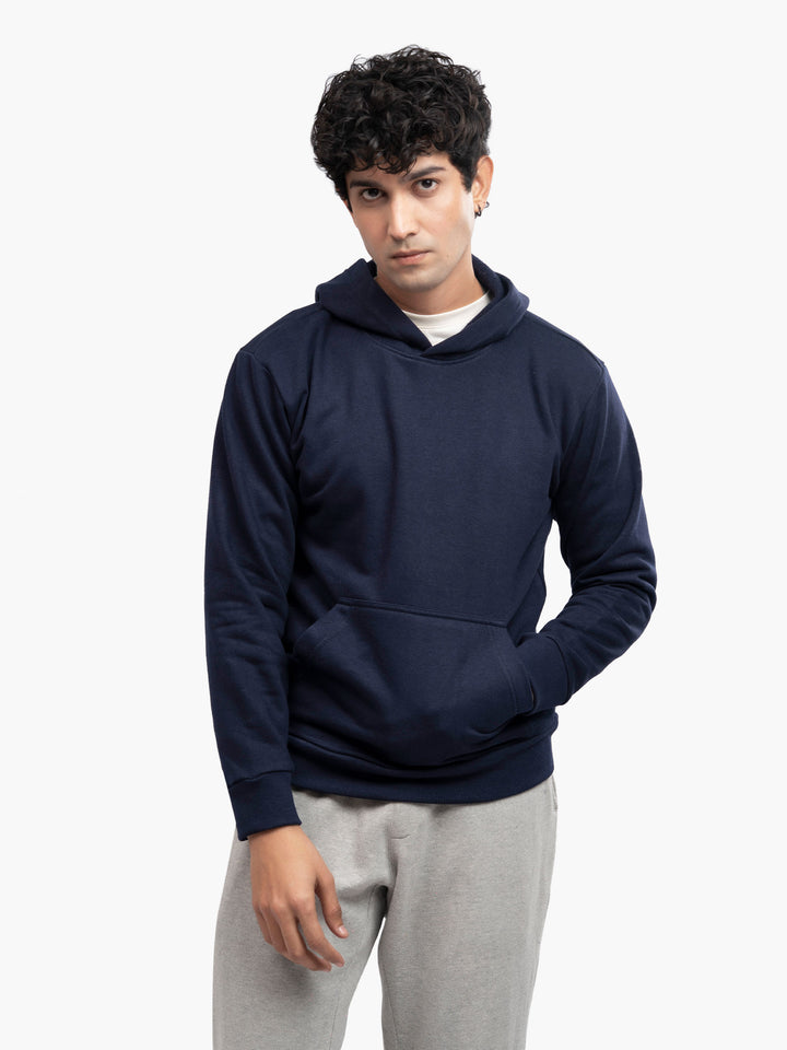 Model wearing navy blue winter hoodie in Pakistan