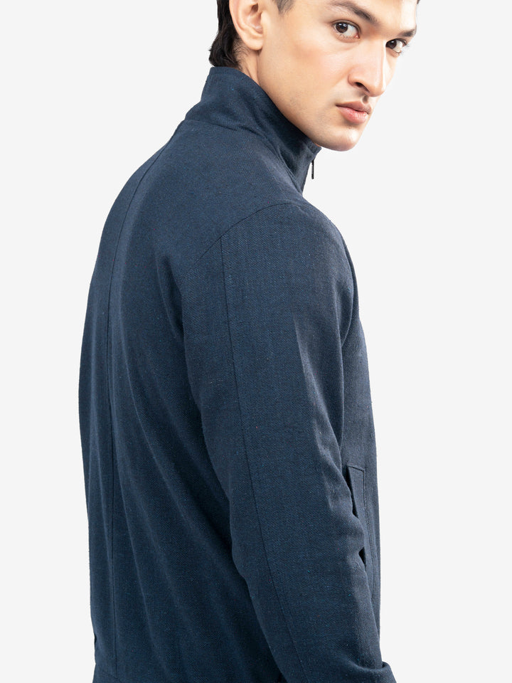 Navy mock neck outerwear texture detailed pose