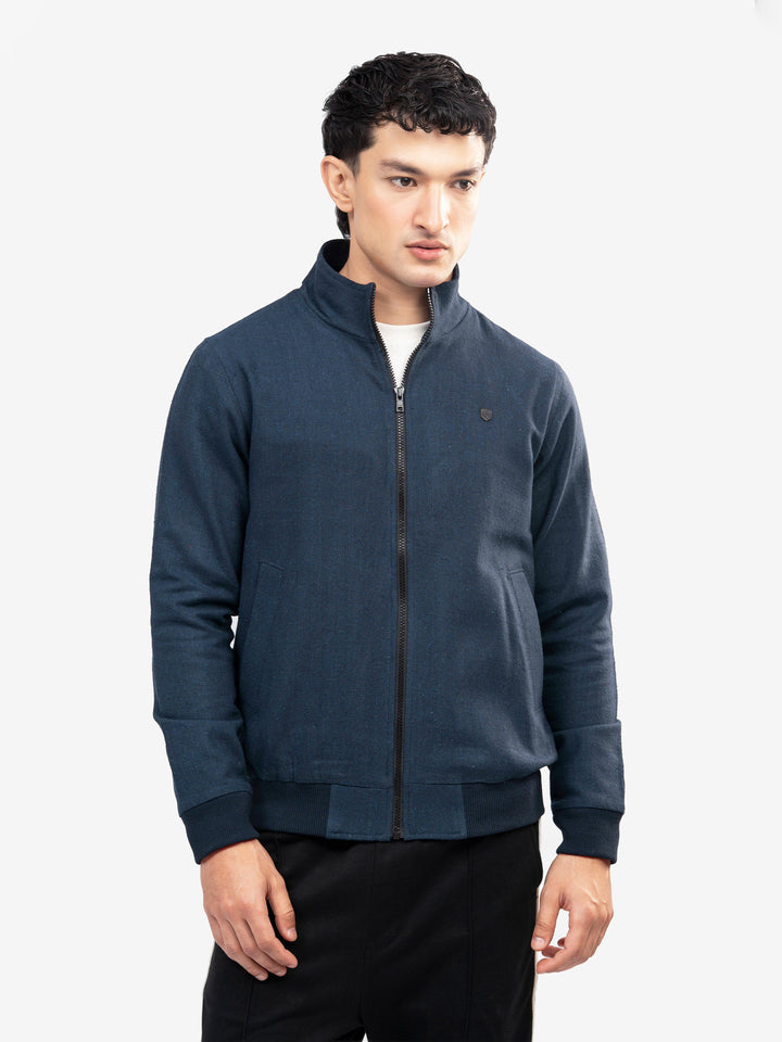  Model wearing navy blue zip-up jacket