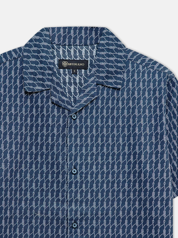 Close up of lightweight 100 percent cotton fabric on navy blue shirt