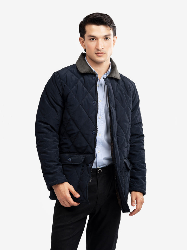 Men's navy blue quilted jacket front view