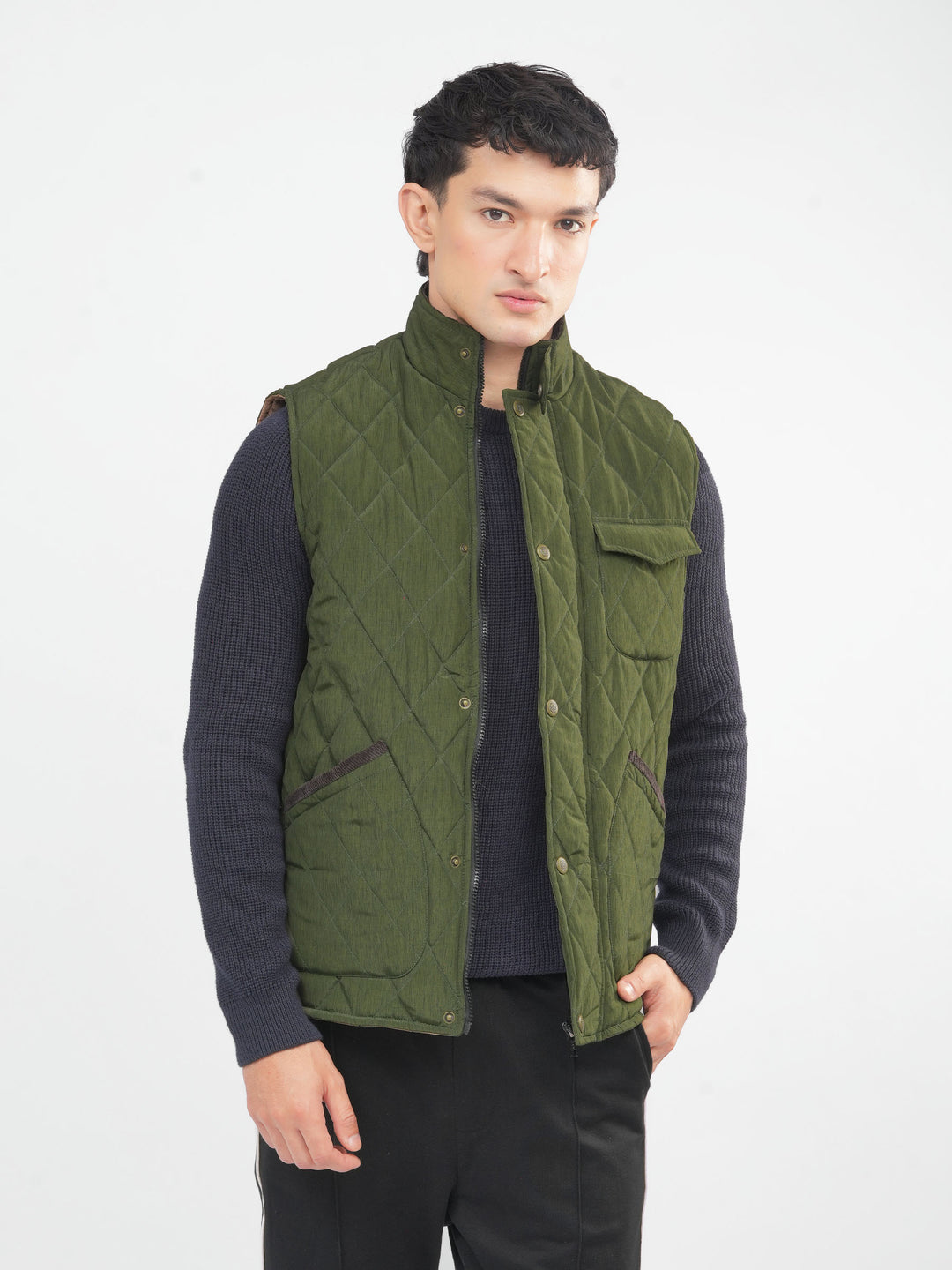 Olive green heritage quilted sleeveless jacket brumano pakistan