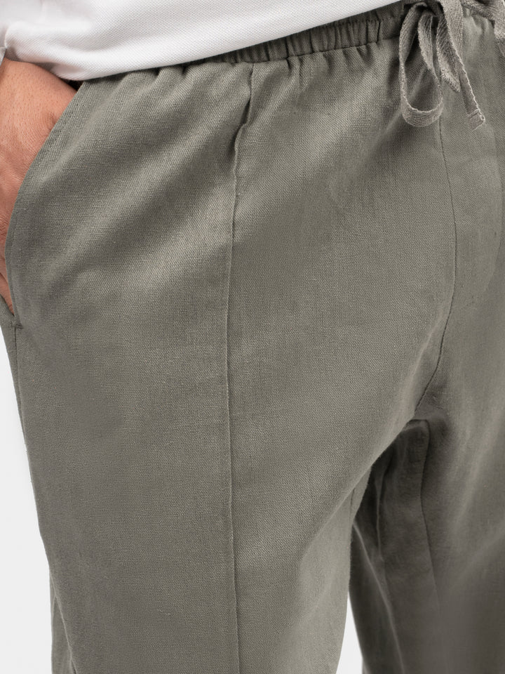 Close-up of cotton linen blend fabric texture in olive green