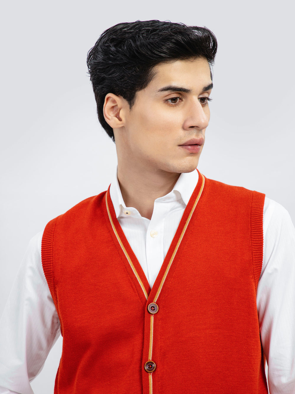 Orange wool blended sleeveless cardigan brumano pakistan