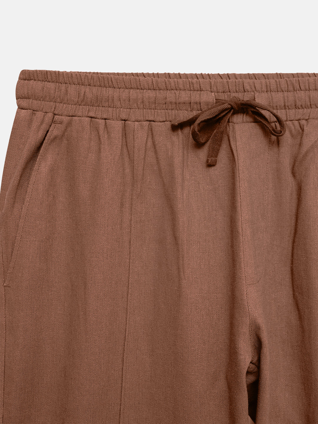 Close-up of breathable cotton linen blend fabric in rusty orange