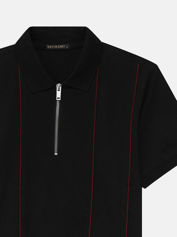 Close-up of quarter-zip closure on black cotton polo