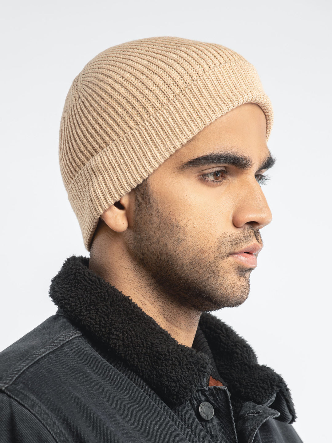 Men's beige knit beanie cap side view — Brumano Pakistan