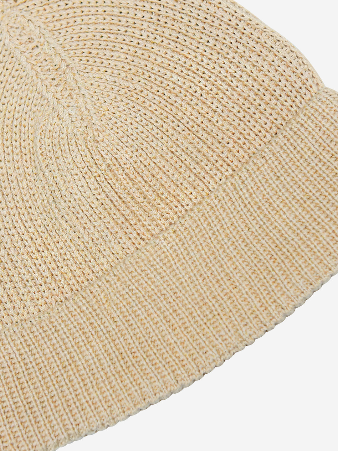 Beige beanie cap close up knit texture — Brumano Pakistan